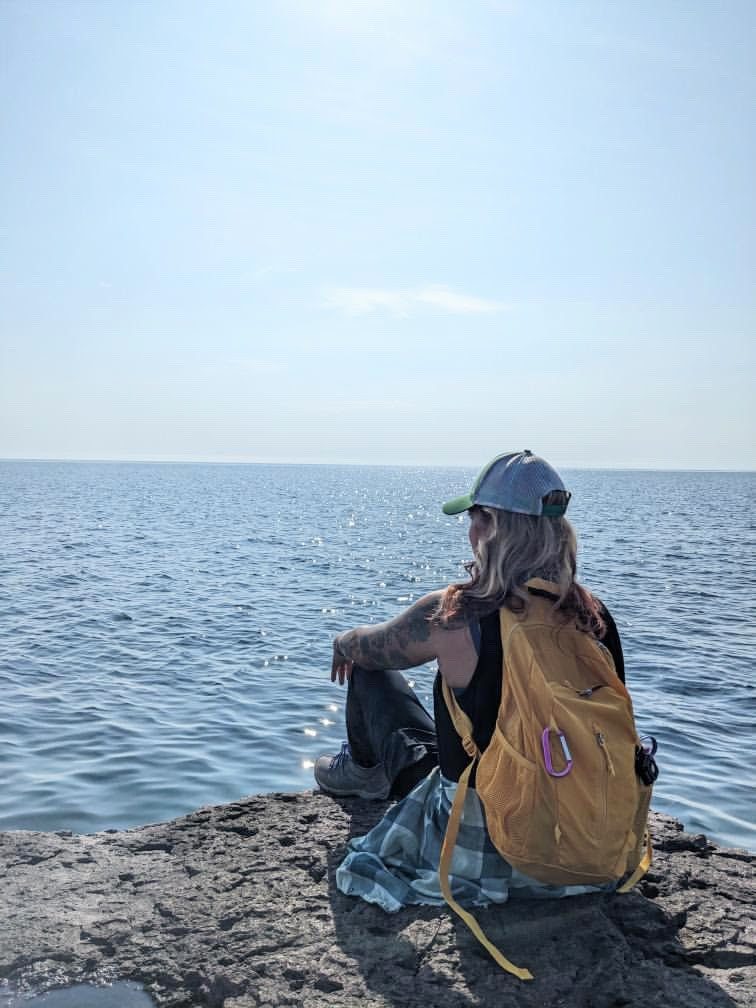 Eddie Bauer Stowaway daypack hiking by lake