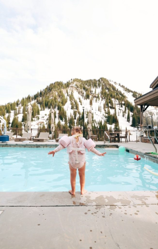 Exterior view of a charming hotel with inviting architecture, suggesting a welcoming and comfortable stay in Utah.