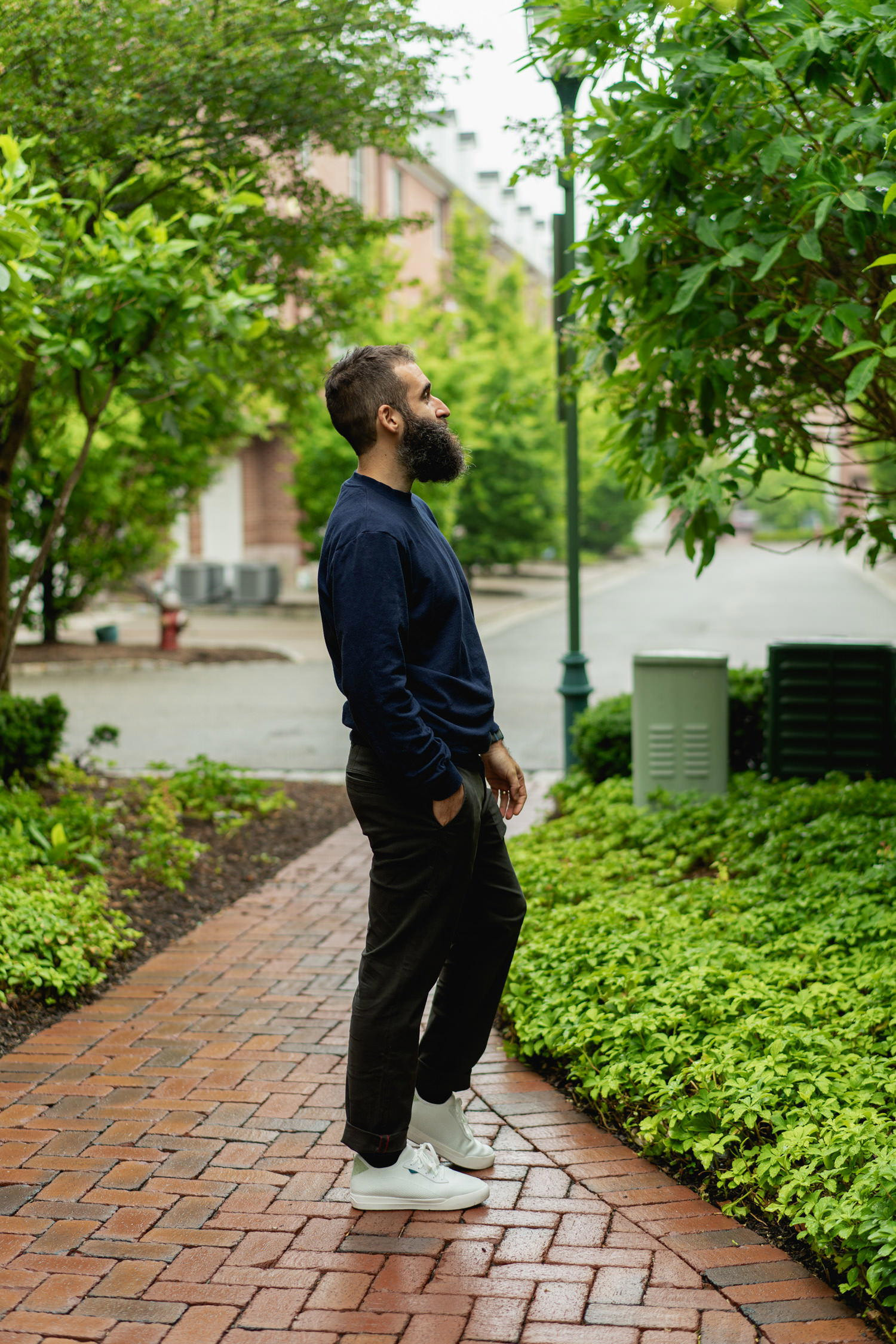 Man wearing Vessi Weekend Chelsea boots, walking confidently on a city street.