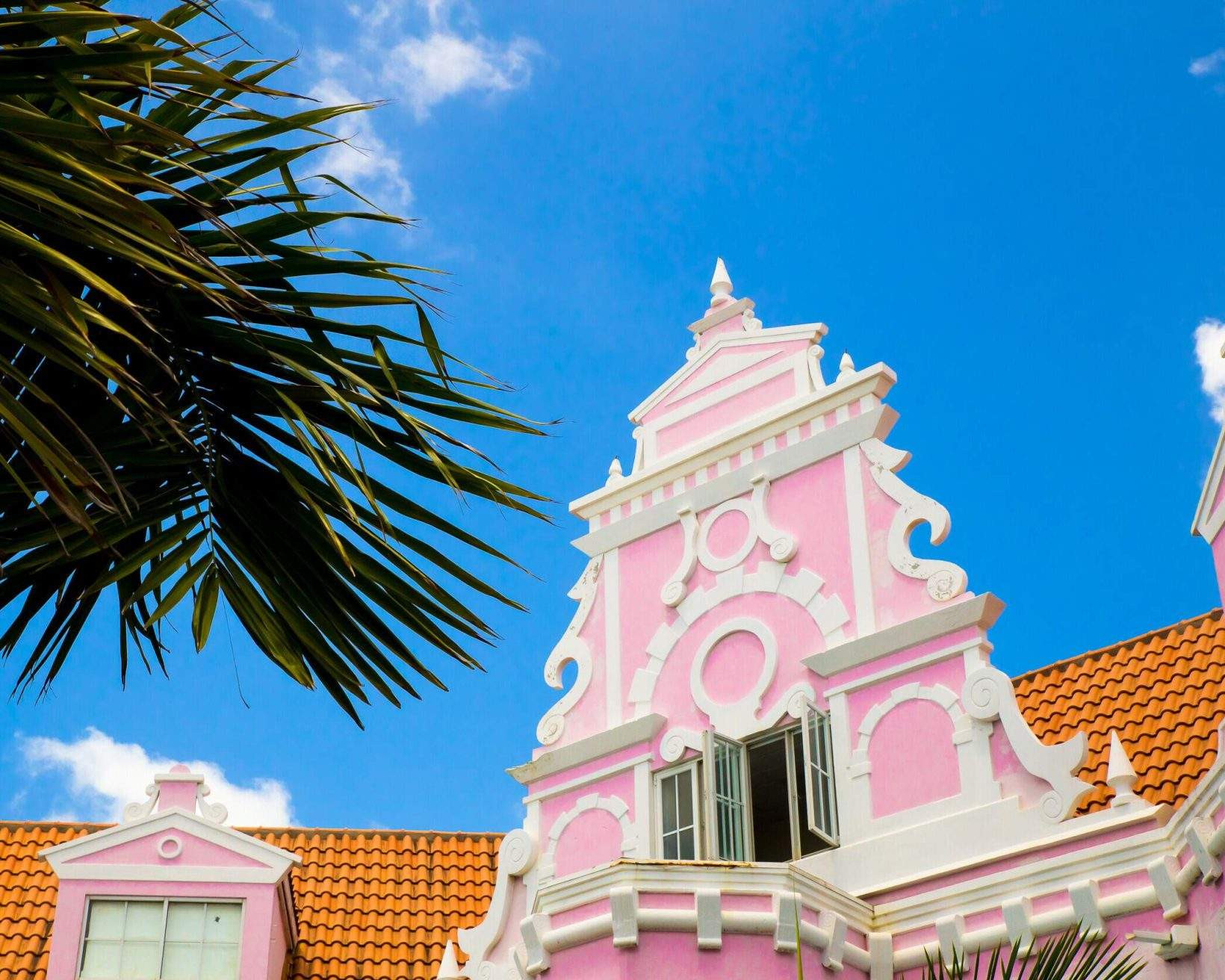Colorful building with pink window in Oranjestad, Aruba