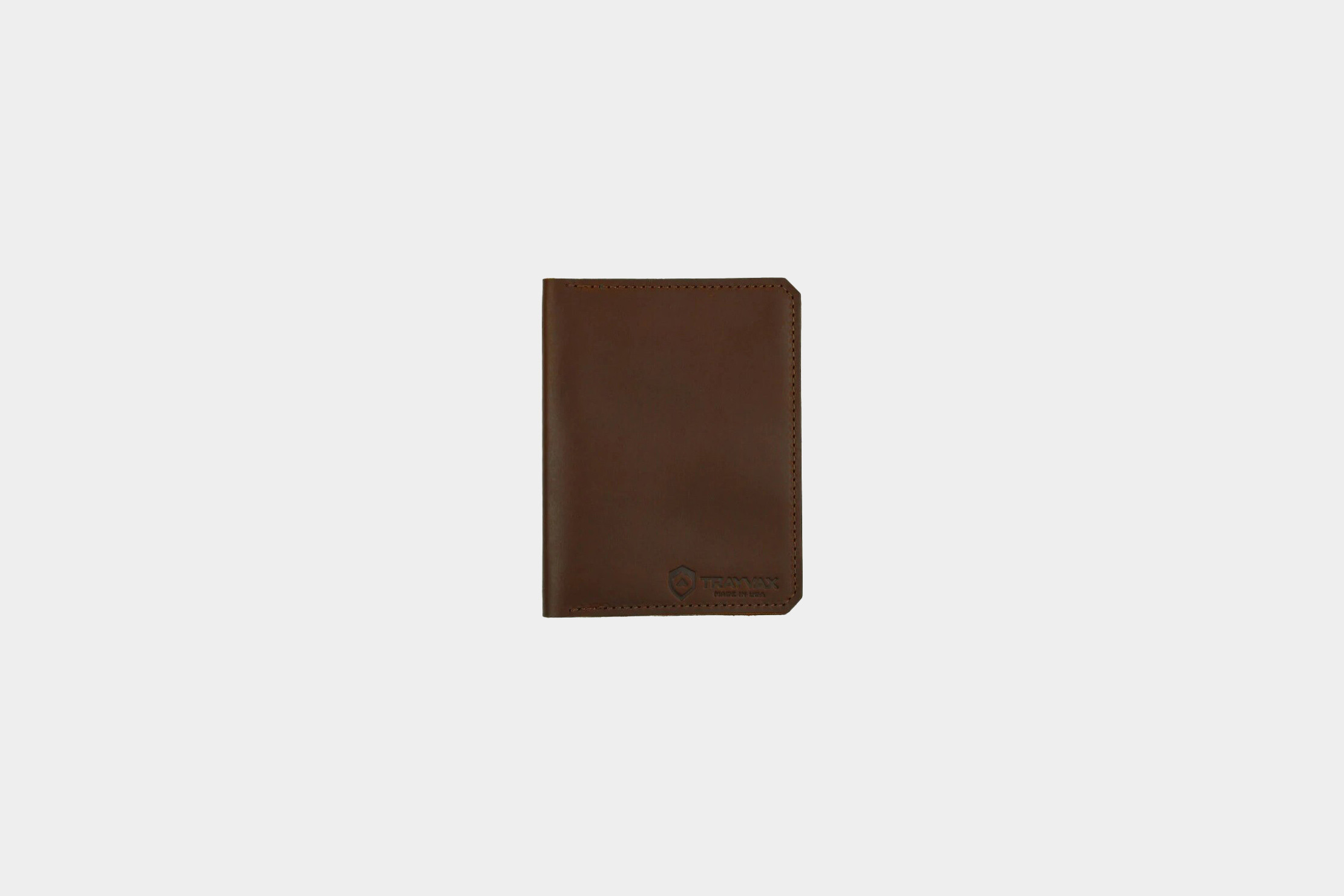 Trayvax Explorer Passport Wallet for Men: Showcasing its rugged American leather and unique design, perfect for adventurous and stylish male travelers.