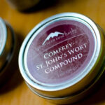 Herbal salve for minor scrapes in a tin container