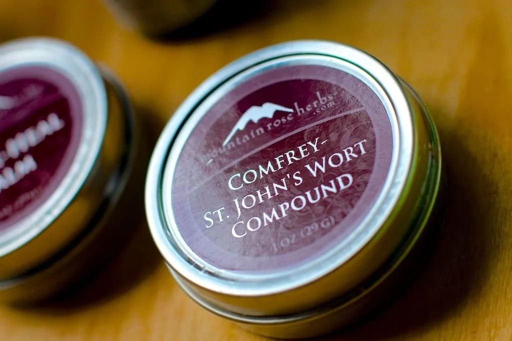 Herbal salve for minor scrapes in a tin container