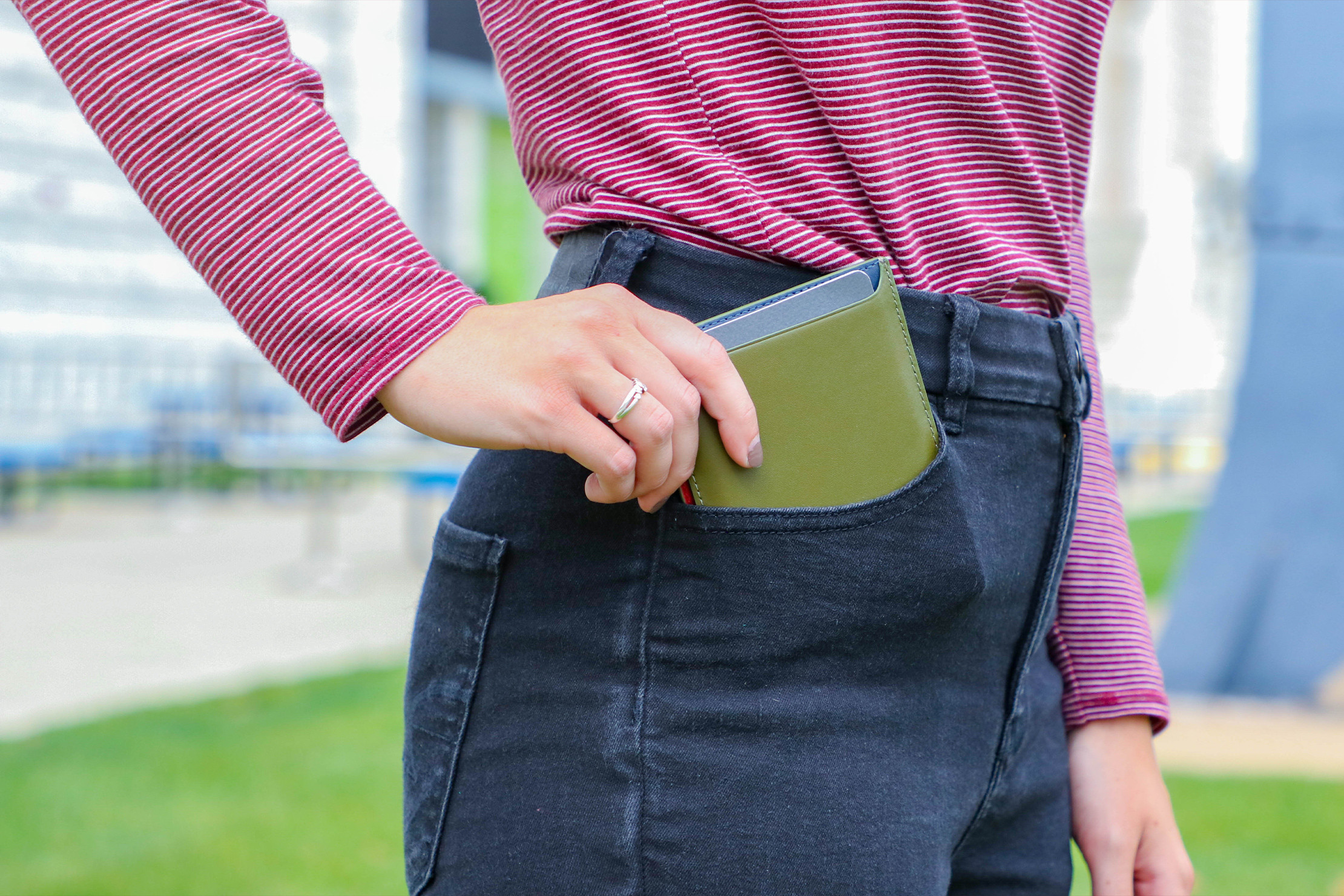Away Passport Holder Review for Men:  Close-up showing the pocket detail, highlighting its unique non-folding design for the modern male traveler.