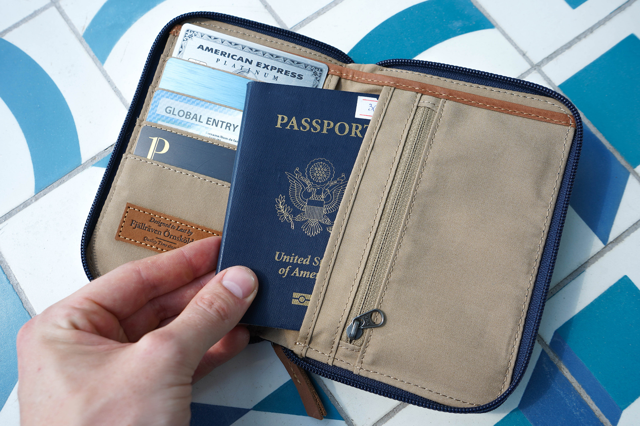 Fjallraven Passport Wallet for Men: Durable G-1000 fabric in a gift guide setting, ideal for the adventurous male traveler.