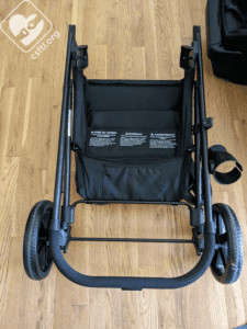 Britax Brook stroller folded, showcasing its compact design for easy storage and transportation.