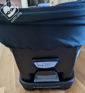 Britax Willow carrier release handle, pointing out the location and function of the handle for easy carrier removal from the base.