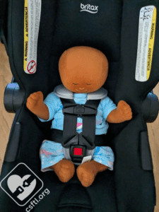 Britax Willow with newborn doll without infant insert, demonstrating the appropriate fit for a 7-pound newborn even without the infant insert.