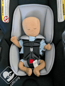Britax Willow Brook with preemie doll and infant insert, demonstrating the snug and secure fit for a 4-pound preemie with the insert in place.