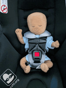 Britax Willow with preemie doll without infant insert, showing the fit for a 4-pound preemie without the insert, still providing a secure harness position.