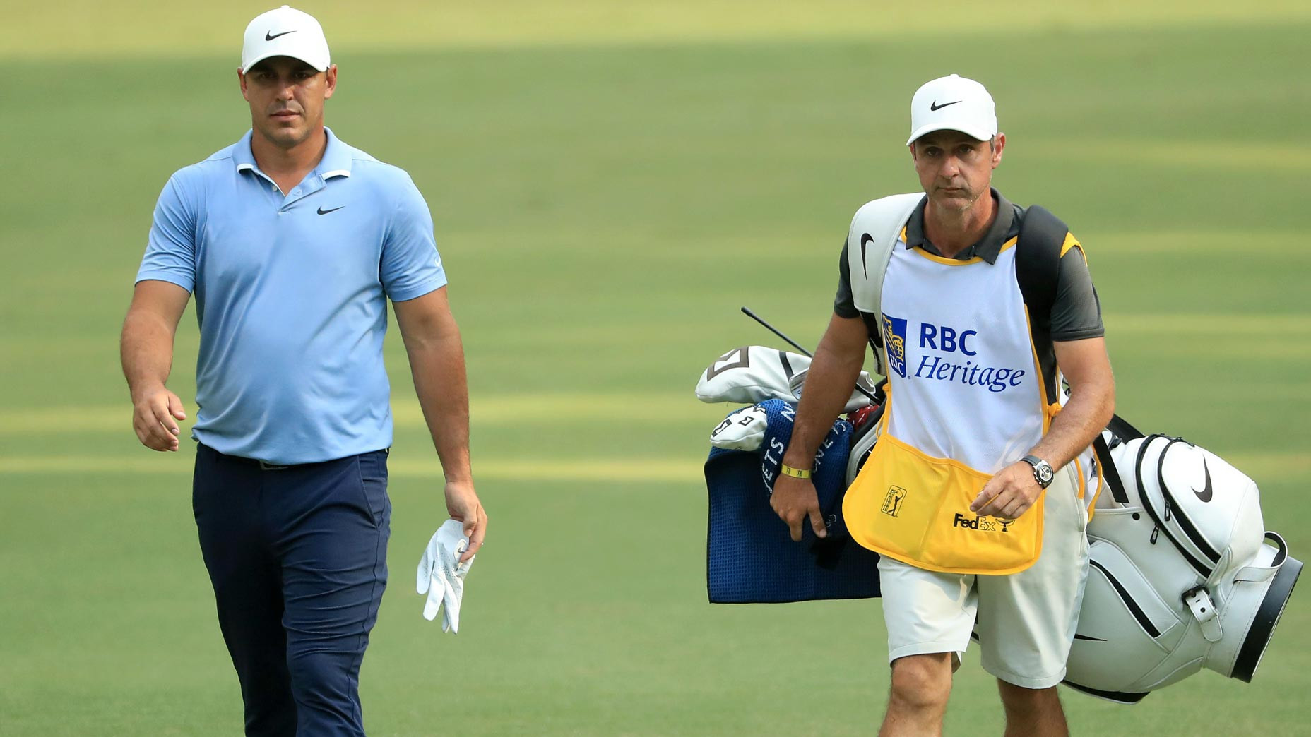 Brooks Koepka's caddie Ricky Elliott, illustrating the impact of coronavirus on the 2020 Travelers Championship.