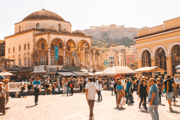 Visit Athens, Greece, one of the cheapest places in Europe to travel, featuring the Acropolis and ancient historical sites.