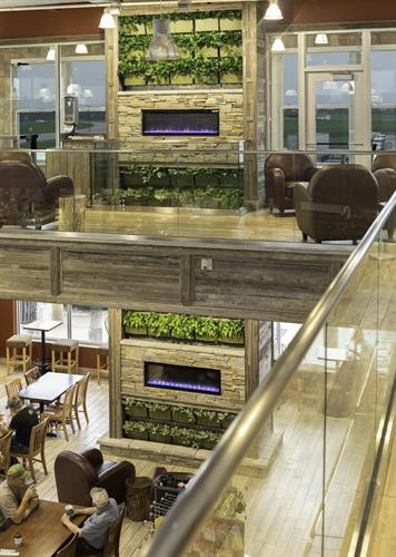 Coffee Cup Travel Plaza Interior with Living Wall Decor