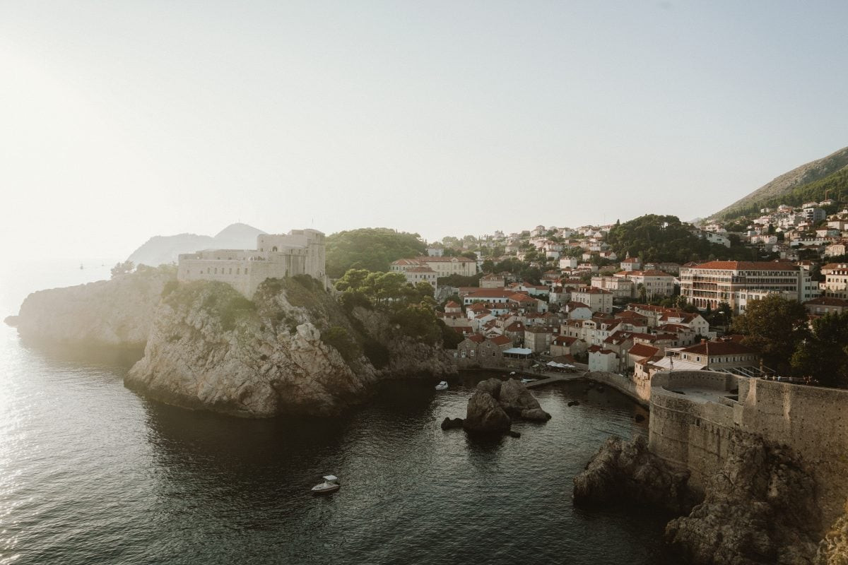 Relaxing day at Danče Beach in Dubrovnik, enjoying the crystal-clear waters of Croatia during your itinerary.