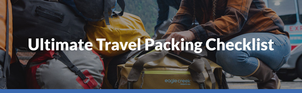 Couple packing luggage with packing cubes