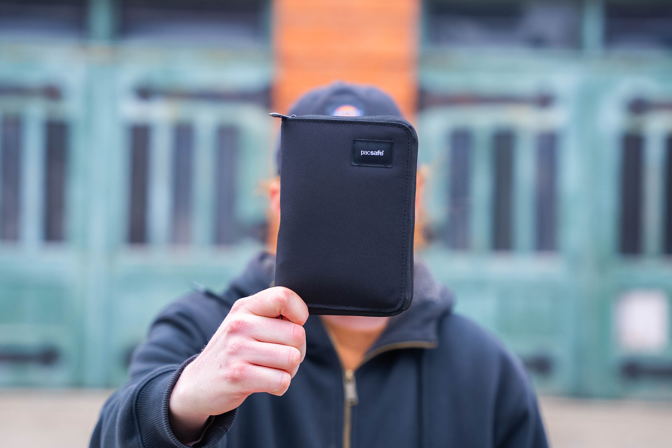 Pacsafe RFIDsafe Compact Travel Organizer Review for Men:  Highlighting its anti-theft features for security-conscious male travelers.