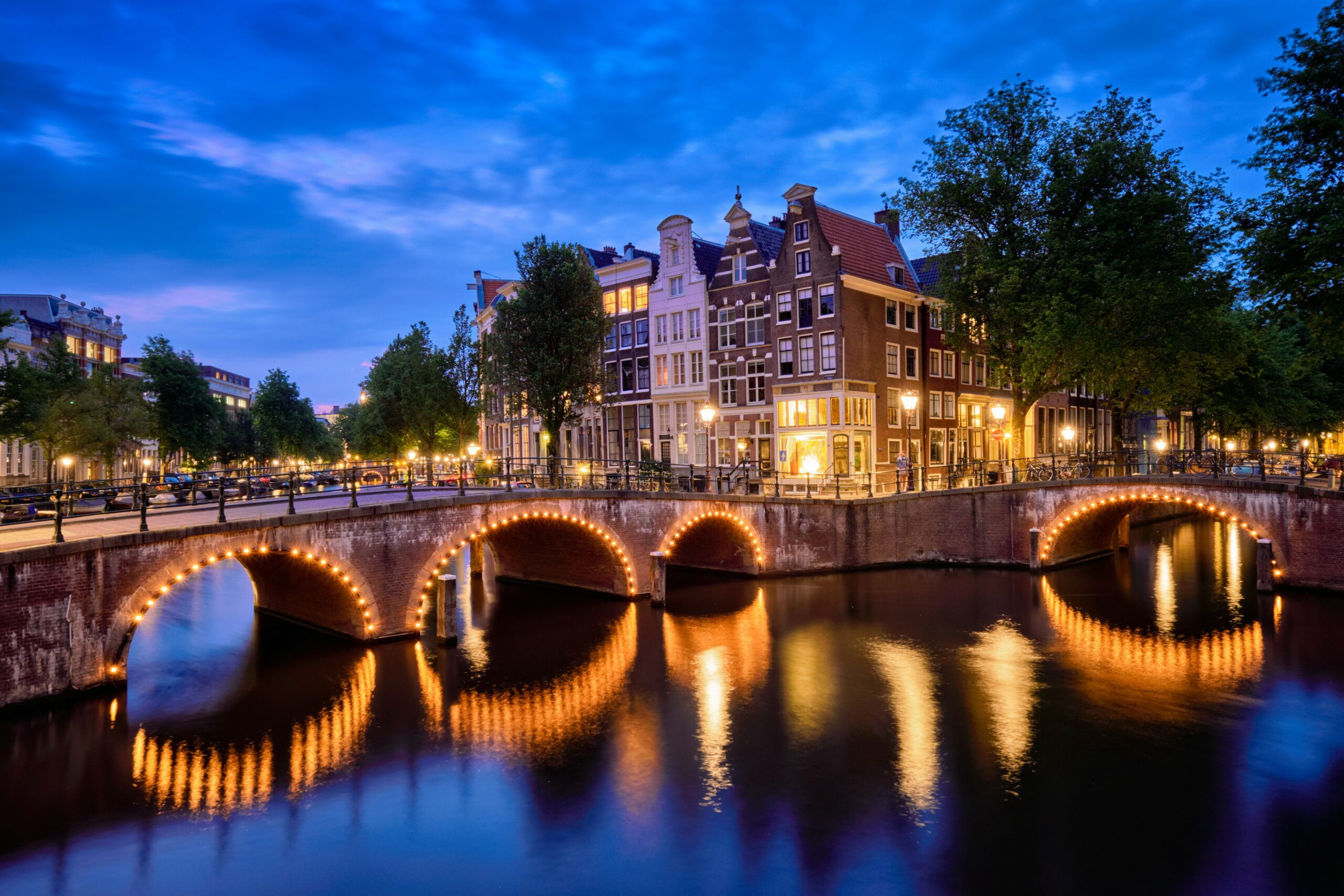 Amsterdam canal illuminated at night