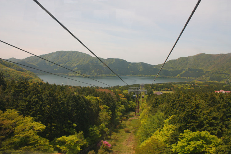The Hakone Ropeway gondolas traveling over volcanic hot springs.