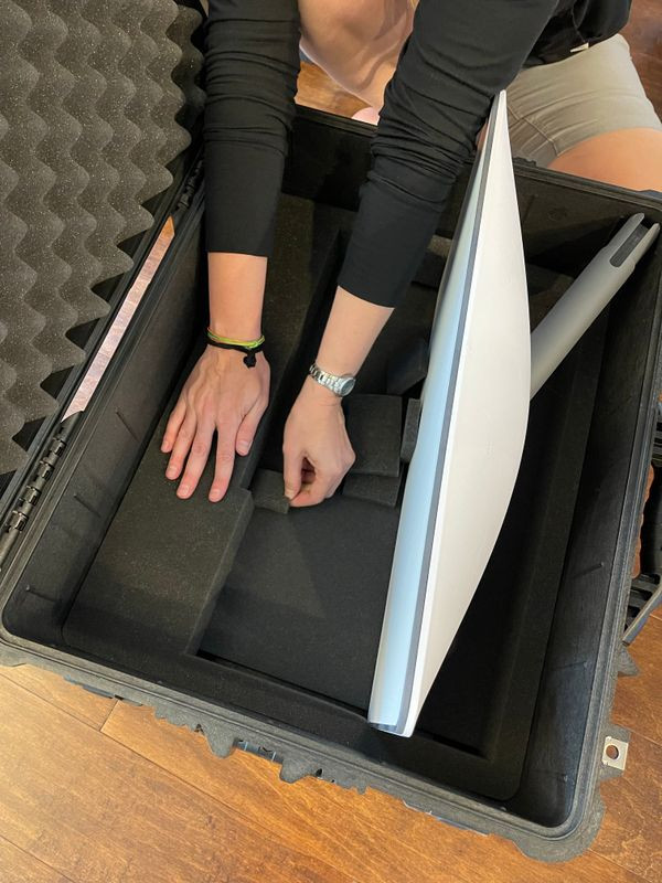 Removing sections of the pick and pluck foam from the Pelican 1610 case to customize the interior for Starlink components.