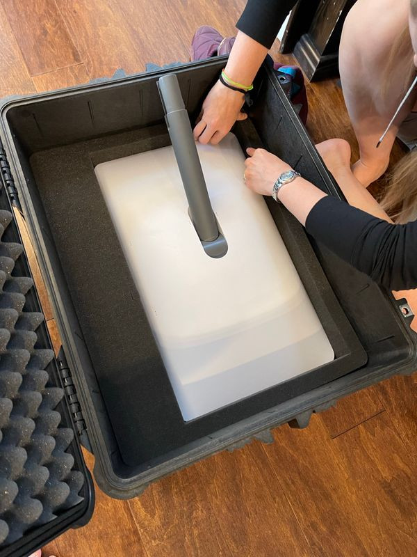 Starlink Gen 2 dish with its non-detachable mounting pole at an angle, making it difficult to store for travel and prone to damage.