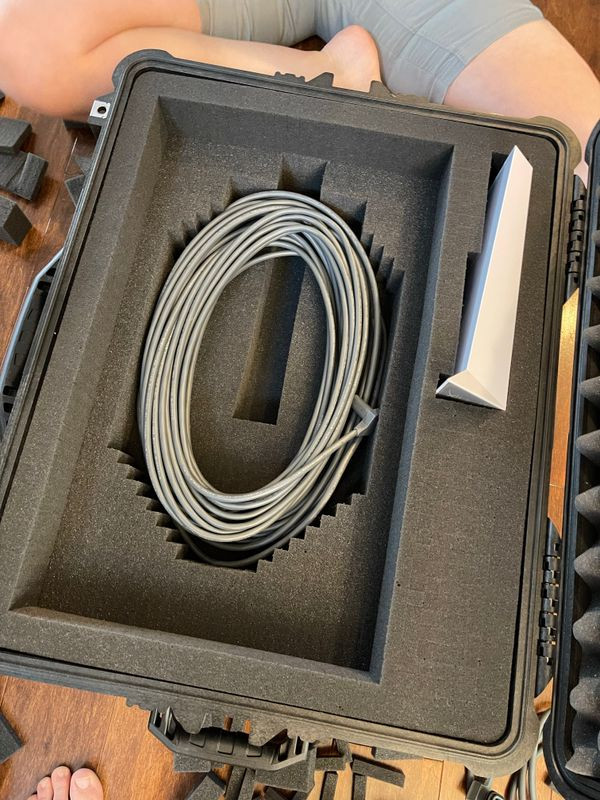 Further foam modification to accommodate the Starlink router and associated cables within the Pelican 1610 travel case.