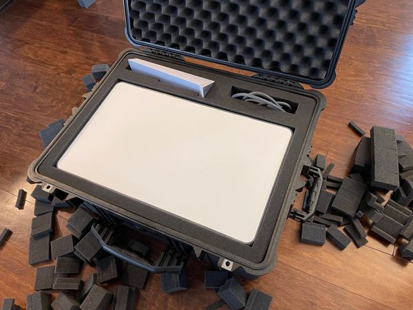 The finalized DIY Starlink travel case with all components – dish, router, and cables – securely and custom-fitted within the Pelican 1610.