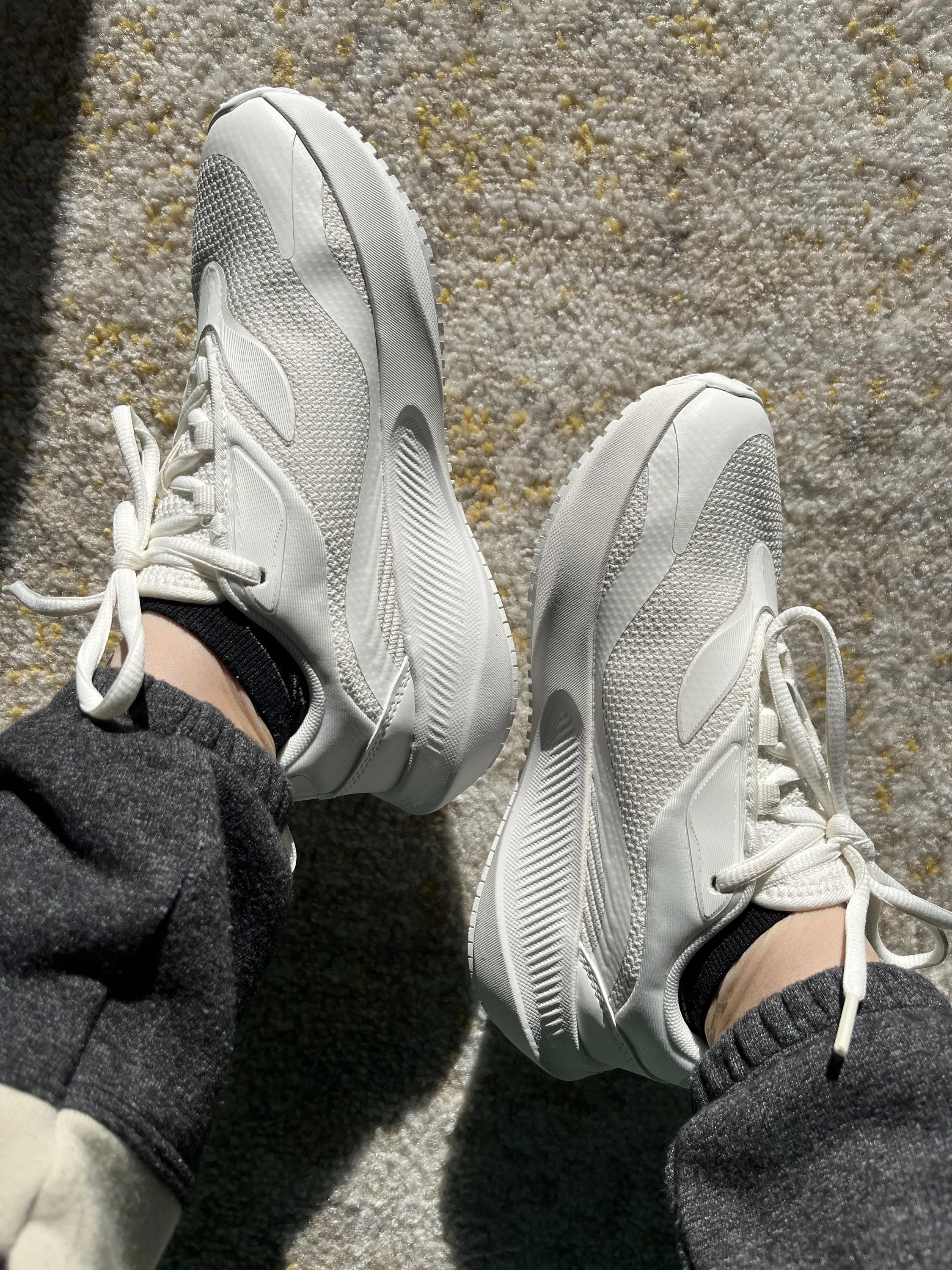 Vessi Tidal Sneakers in a lifestyle setting, showcasing the half-size option.