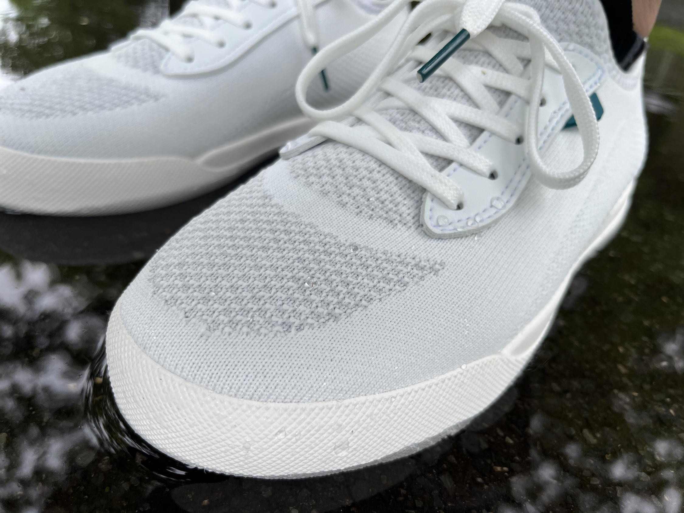 Water beading test on Vessi Weekend Sneakers.