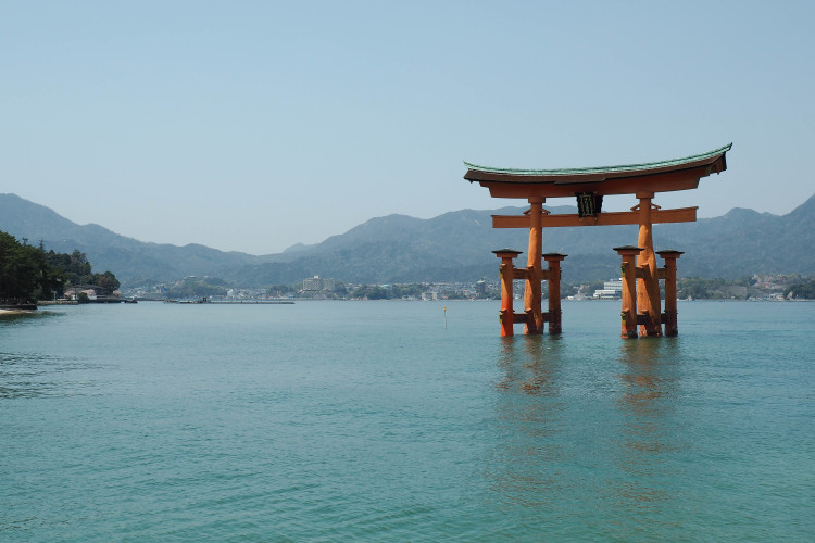Itsukushima Shrine on Miyajima Island, Japan, at high tide, appearing to float on water.