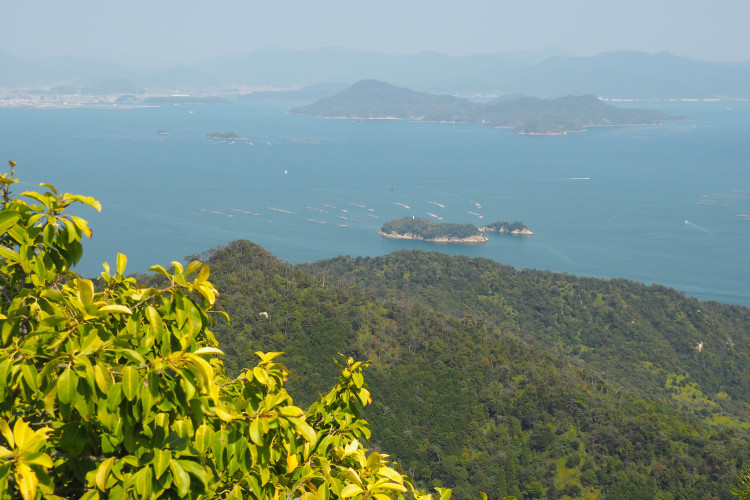 Panoramic view from Mt. Misen, Miyajima Island, Japan, overlooking islands and sea.