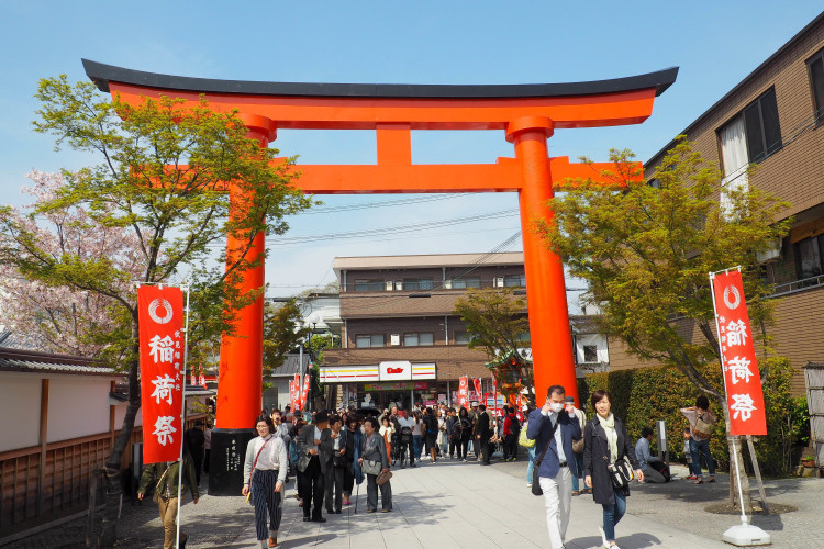 A vibrant street scene in Japan, showcasing the blend of modern and traditional elements.