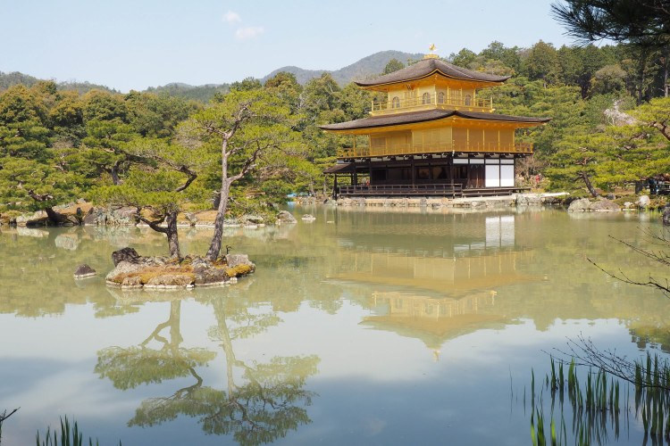 The Golden Pavilion (Kinkaku-ji) in Kyoto, reflecting in the pond.