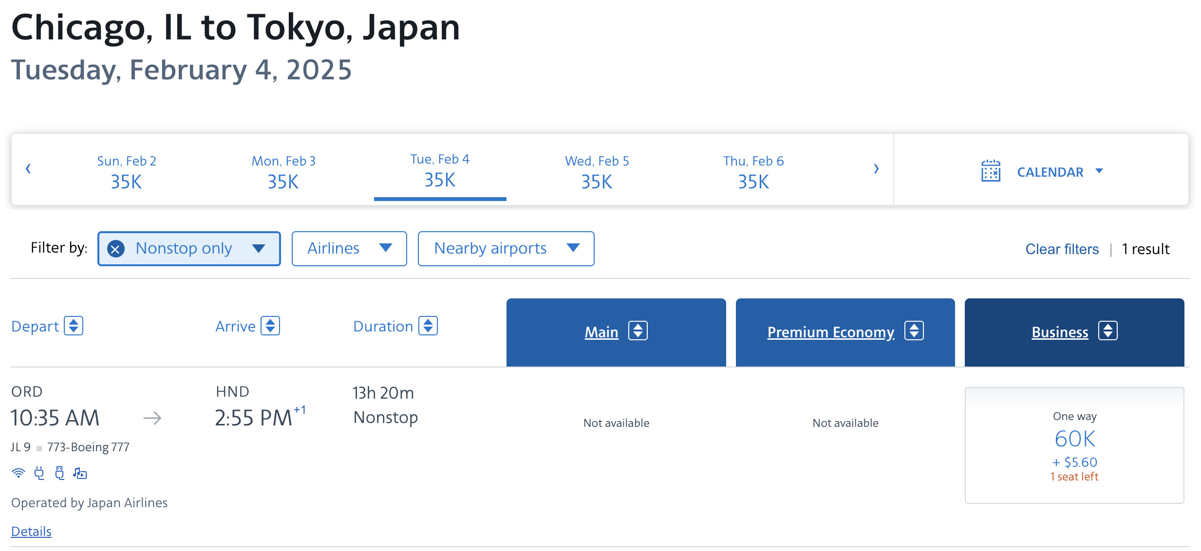 Cathay Pacific business class cabin, highlighting the premium travel experience available through AA travel partners.