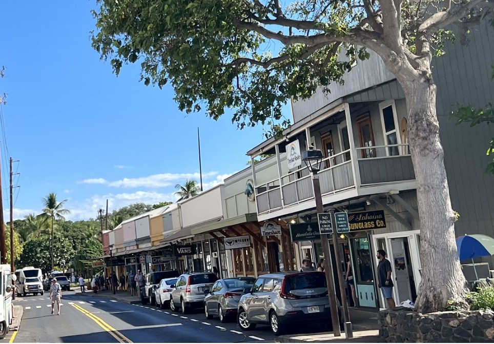Pre-fire view of Front Street in Lahaina, Maui, showcasing the vibrant town before the devastating wildfires, highlighting the loss felt by the travel industry and community.