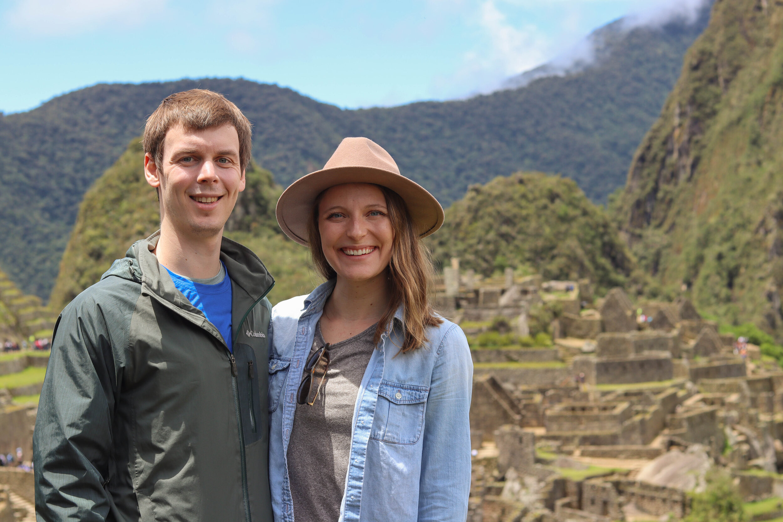 Machu Picchu ancient ruins and surrounding mountains under a clear blue sky