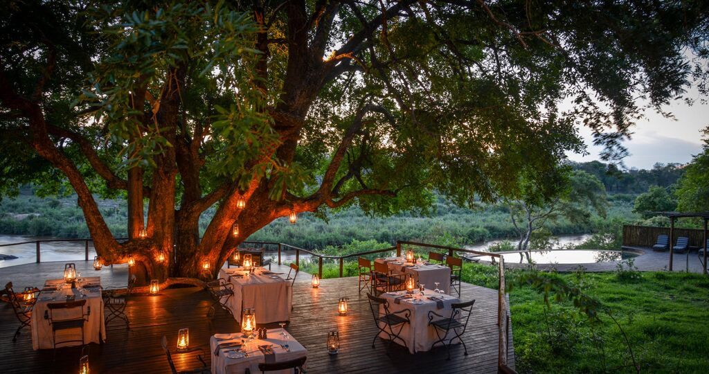 Luxury dining deck at Lion Sands hotel in Kruger National Park, South Africa