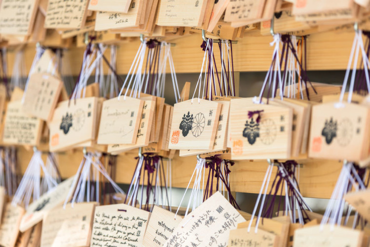 A traditional wooden structure at Meiji Shrine, with intricate details and peaceful surroundings.