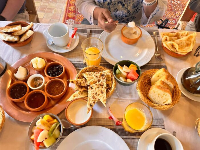 A typical Moroccan breakfast spread, featuring pancakes and local delicacies