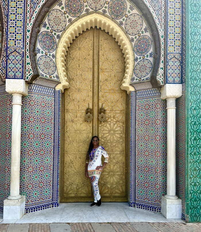 The ornate doors of the Royal Palace in Fes, showcasing intricate Moroccan design