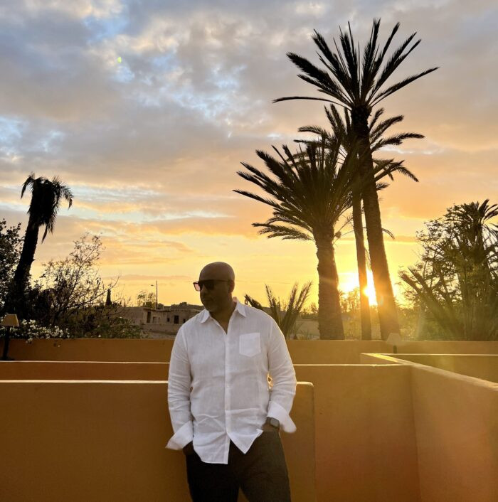 Enjoying the sunset from the rooftop of Jnane Tamsna hotel in Marrakech, with panoramic views