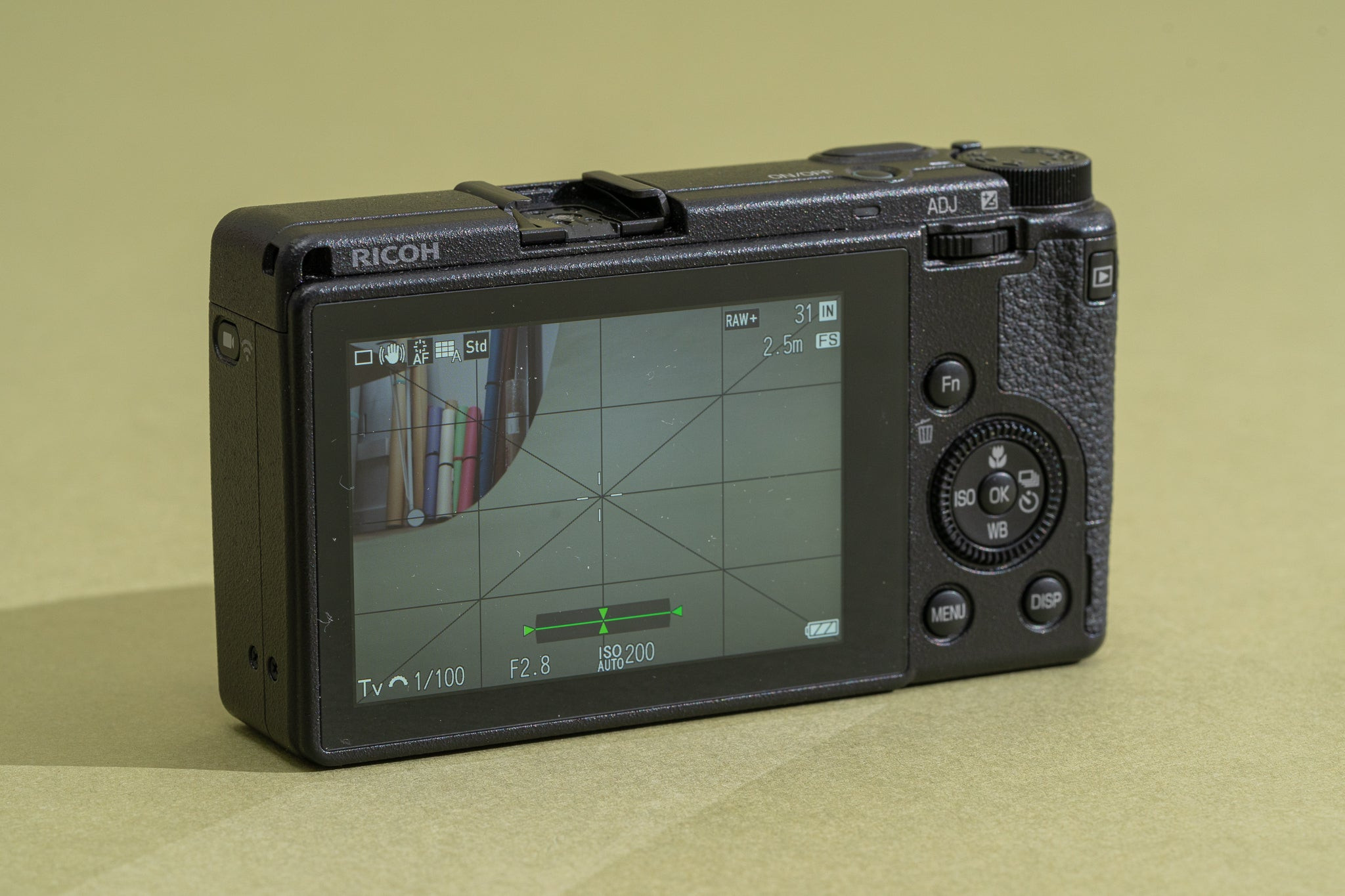 Close up of the Ricoh GR III screen showing its user-friendly interface and customizable settings, beneficial for quick adjustments while traveling