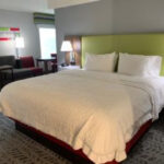 Hampton Inn Suite in Travelers Rest, SC featuring a spacious living area and separate bedroom