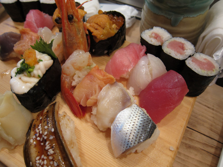 Fresh sushi breakfast at Tsukiji Fish Market in Tokyo.