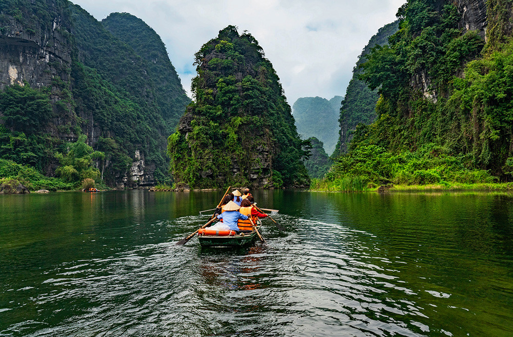 Trang An landscape in Vietnam, showcasing natural beauty and affordability.