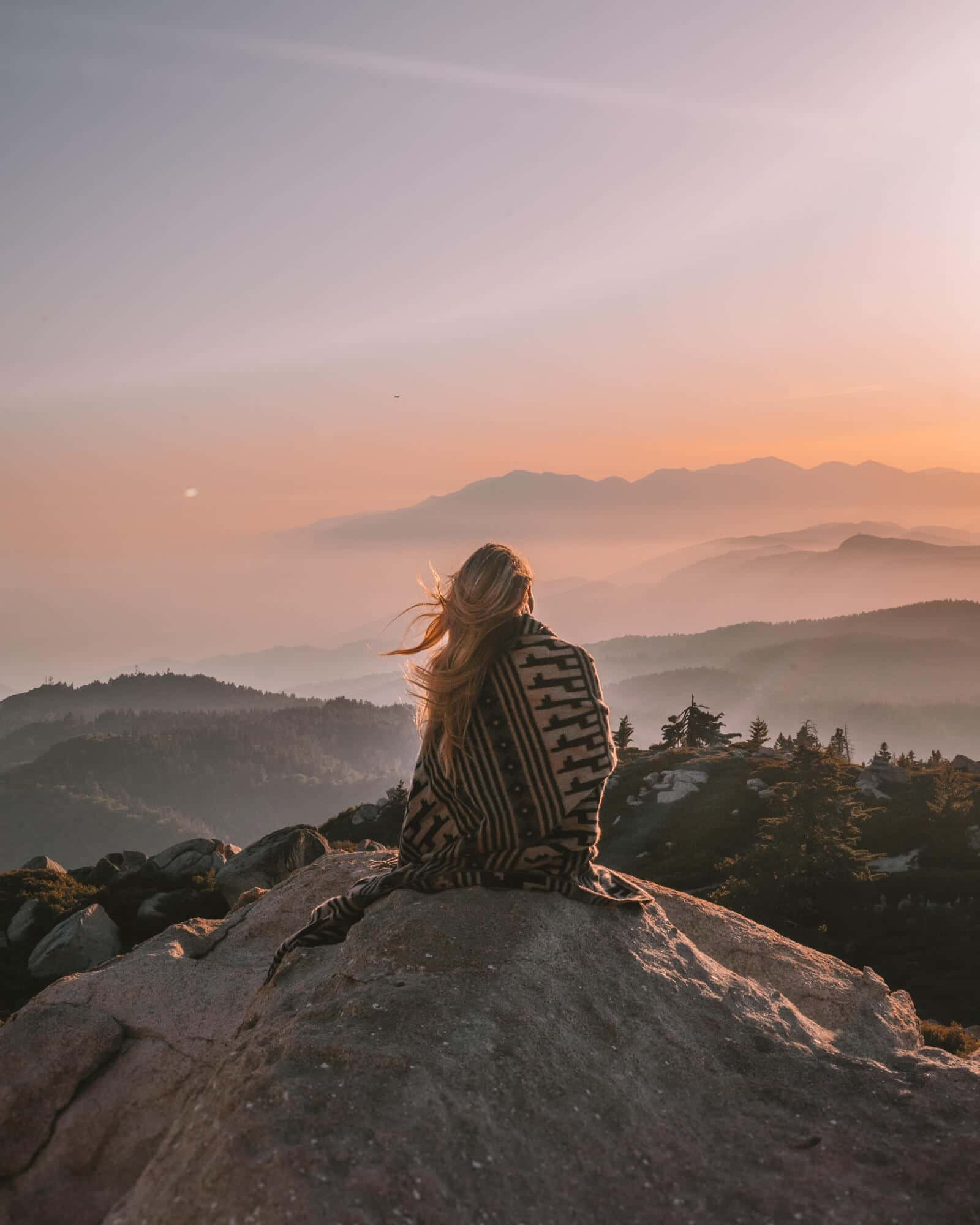 Sunset casting a warm glow over the mountains in Big Bear, California