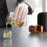 Compact travel tea set with wooden tray and carrying case