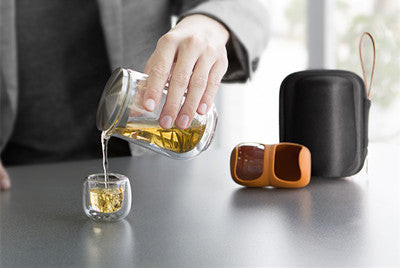 Compact travel tea set with wooden tray and carrying case
