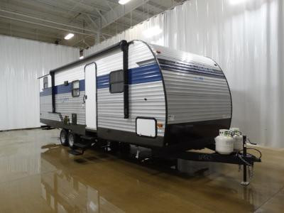 Bunkhouse travel trailer emphasizing its family-friendly layout with bunk beds and ample living space.