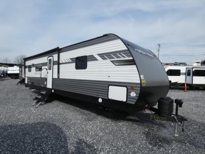 Luxury travel trailer showing a well-appointed interior with modern amenities and spacious living area, for a premium camping experience.
