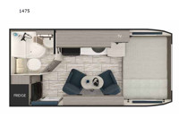 Comfortable Interior of Lance Travel Trailer 1475 featuring Queen Bed and Swivel Chairs